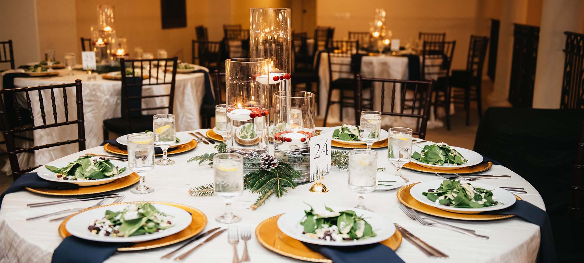 Spring salad on wedding tables with florals